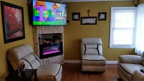 TV, fireplace, DVD player, books