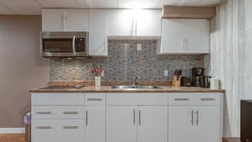 Fridge, microwave, dishwasher, coffee/tea maker