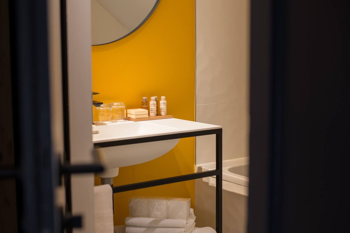 triple room | bathroom | shower, rainfall showerhead, hair dryer, bathrobes