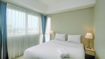 Apartment, Non Smoking, Kitchenette | 2 bedrooms, iron/ironing board, bed sheets