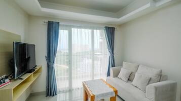 Apartment, Non Smoking, Kitchenette | Living room | TV