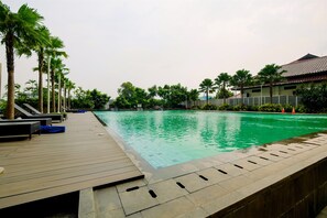 Outdoor pool - Relax Studio Apartment at Capitol Park Residence (Jakarta)