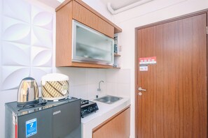 Apartment, Non Smoking, Kitchenette | Private kitchen | Fridge, stovetop, dishwasher, electric kettle - Cozy and Tranquil Studio Apartment at Gunung Putri Square (Gunung Putri)