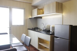 Departamento, para no fumadores, cocineta | Cocina privada | Refrigerador y utensilios de cocina