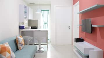 Apartamento, para não fumantes, cozinha americana | Sala de estar | TV