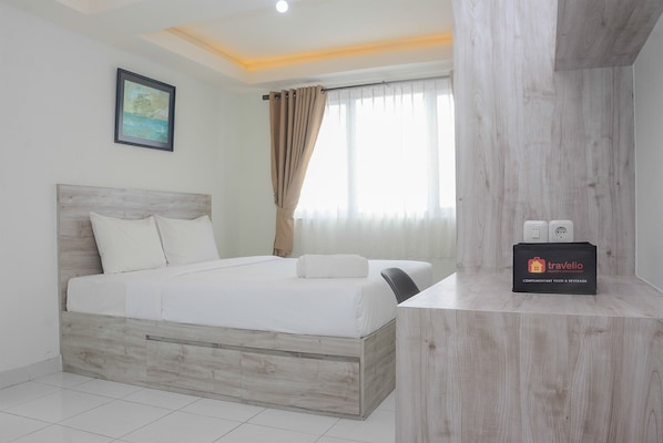 Apartment, Non Smoking, Kitchenette | 1 bedroom, iron/ironing board, free WiFi, bed sheets - Comfy and Minimalist Studio at Amethyst Apartment (Jakarta)