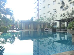 Outdoor pool - Chic and Cozy 2BR Apartment at Pinewood Jatinangor near JATOS (Cileunyi)