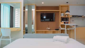 Apartamento, para não fumantes, cozinha americana | 1 quarto, escrivaninha, ferros/tábuas de passar roupa, Wi-Fi de cortesia