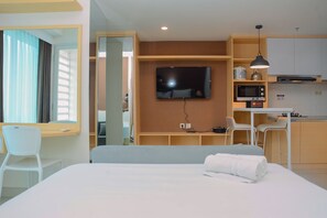 Apartamento, para não fumantes, cozinha americana | 1 quarto, escrivaninha, ferros/tábuas de passar roupa, Wi-Fi de cortesia