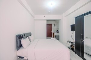 1 habitación, tabla de planchar con plancha, wifi gratis y ropa de cama 