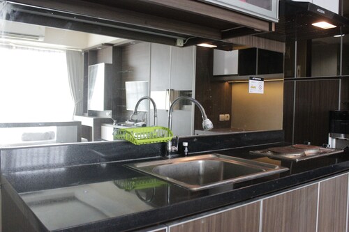 Modern Chic Studio Apartment at Tamansari La Grande near BIP