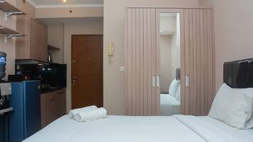 Apartamento, para não fumantes, cozinha americana | 1 quarto, escrivaninha, ferros/tábuas de passar roupa, Wi-Fi de cortesia