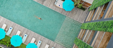 2 outdoor pools, pool umbrellas, pool loungers