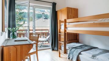 4 bedrooms, desk, iron/ironing board, travel cot