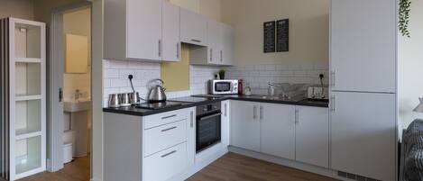 City Studio | Living area | Flat-screen TV