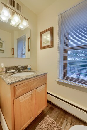 Combined shower/tub, hair dryer, towels, soap
