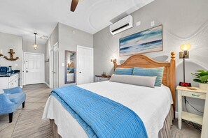 Tabla de planchar con plancha, wifi gratis y ropa de cama 