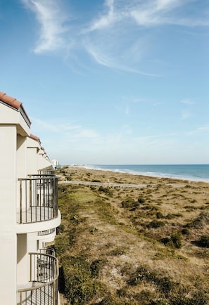 On the beach, sun-loungers, beach towels