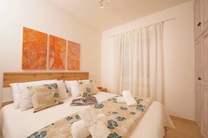 2 dormitorios, tabla de planchar con plancha, wifi gratis y ropa de cama