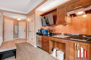 Fridge, microwave, stovetop, coffee/tea maker