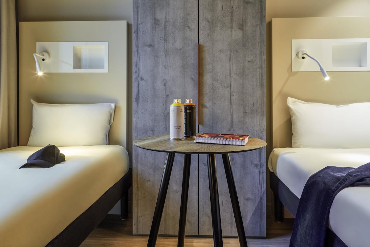 triple room, 3 single beds | individually furnished, blackout curtains, soundproofing