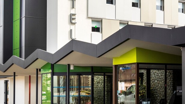 A modern hotel with a prominent "ibis Styles" sign, a glass entrance, and a clean, contemporary facade. - ibis Styles Thonon Les Bains Hotel (Thonon-les-Bains)