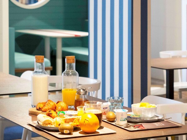 Daily buffet breakfast (EUR 13.50 per person)