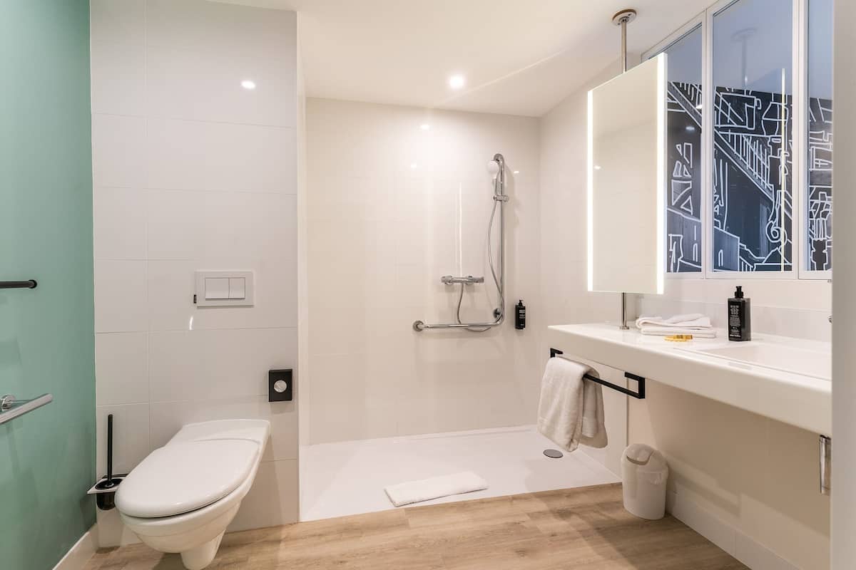 eco-friendly toiletries, hair dryer, towels