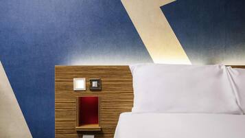 Desk, laptop workspace, blackout drapes, iron/ironing board