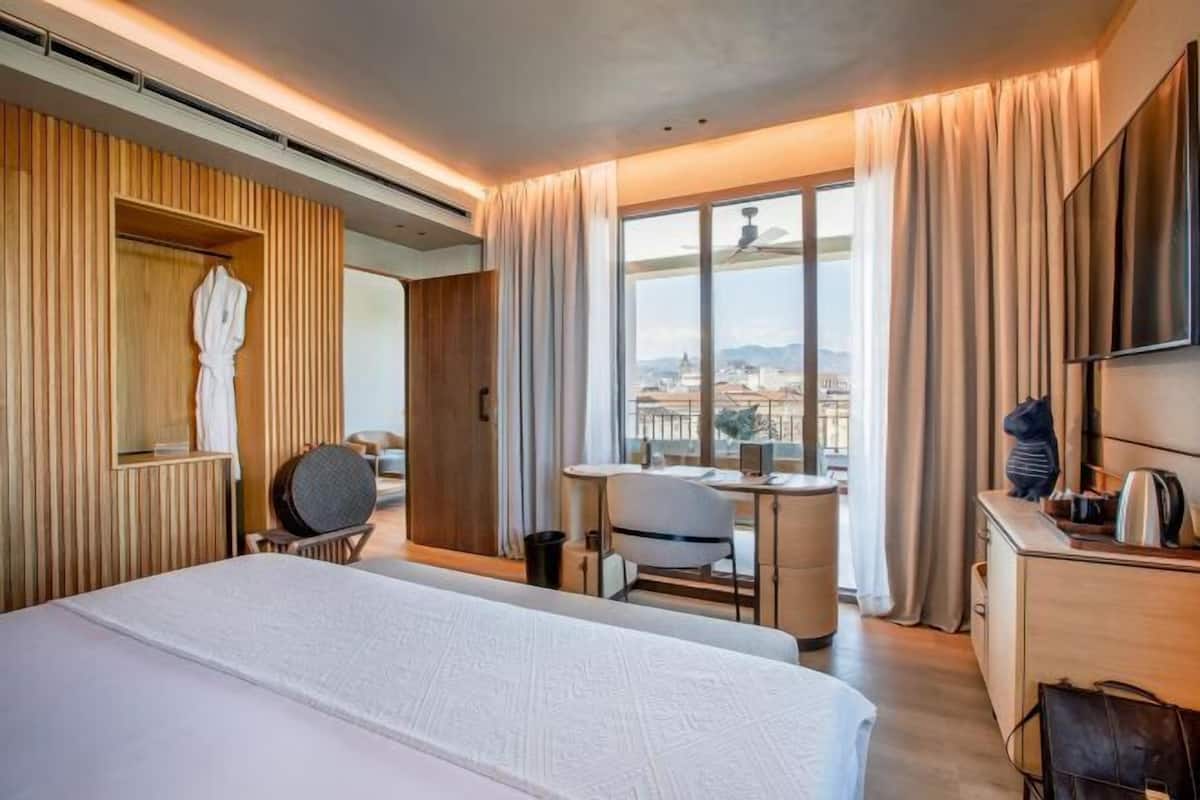 Premium bedding, memory-foam beds, minibar, in-room safe