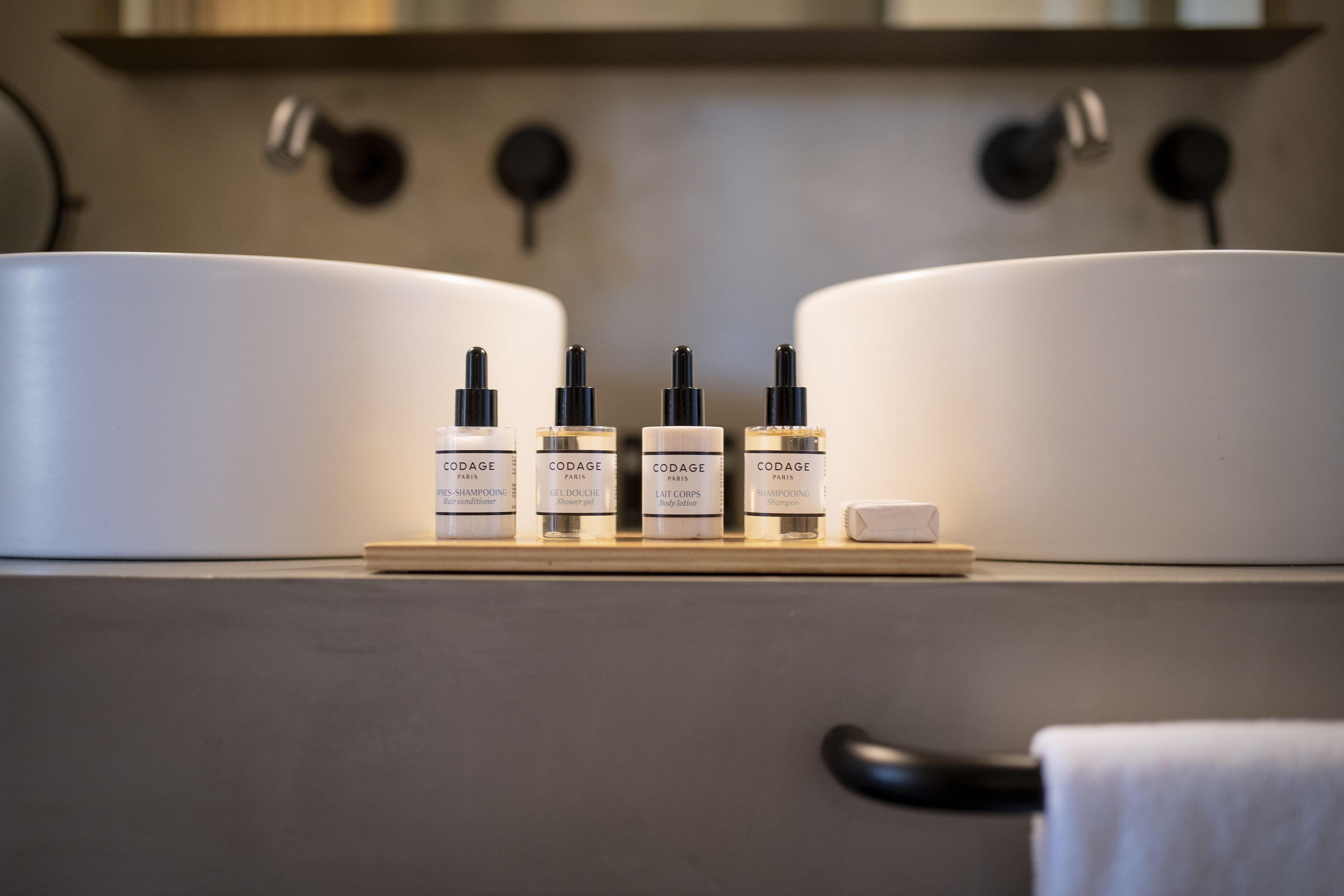 rainfall showerhead, hair dryer, bathrobes, slippers