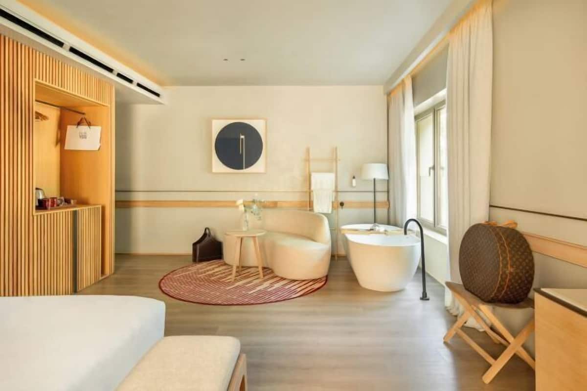 Premium bedding, memory-foam beds, minibar, in-room safe