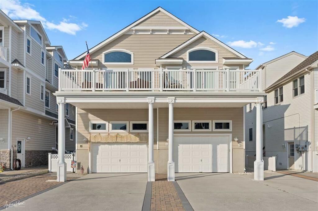 Gorgeous 3 story town home located only 11 doors from the beach.