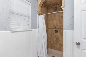 Combined shower/tub