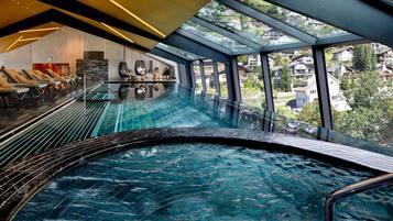 Indoor pool, open 7:00 AM to 10:00 PM, sun loungers