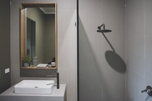 Bathtub, hair dryer, towels, soap