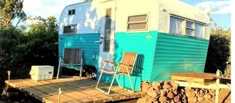While not a hotel, the Feather Trailer provides a relaxed, peaceful retreat in nature with the warmth and convenience you need for a memorable outdoor getaway.