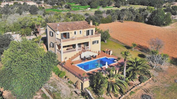A two-story house with a swimming pool, surrounded by trees and fields. - Can Claret Gran 176 wonderful villa with private pool, large terrace, air conditioning and WiFi (Cas Concos)