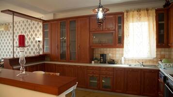 Dishwasher, paper towels, dining tables