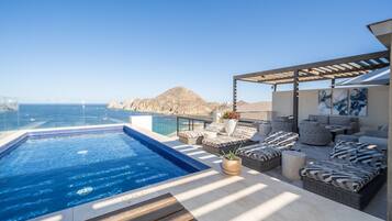 2 outdoor pools, pool umbrellas, sun loungers