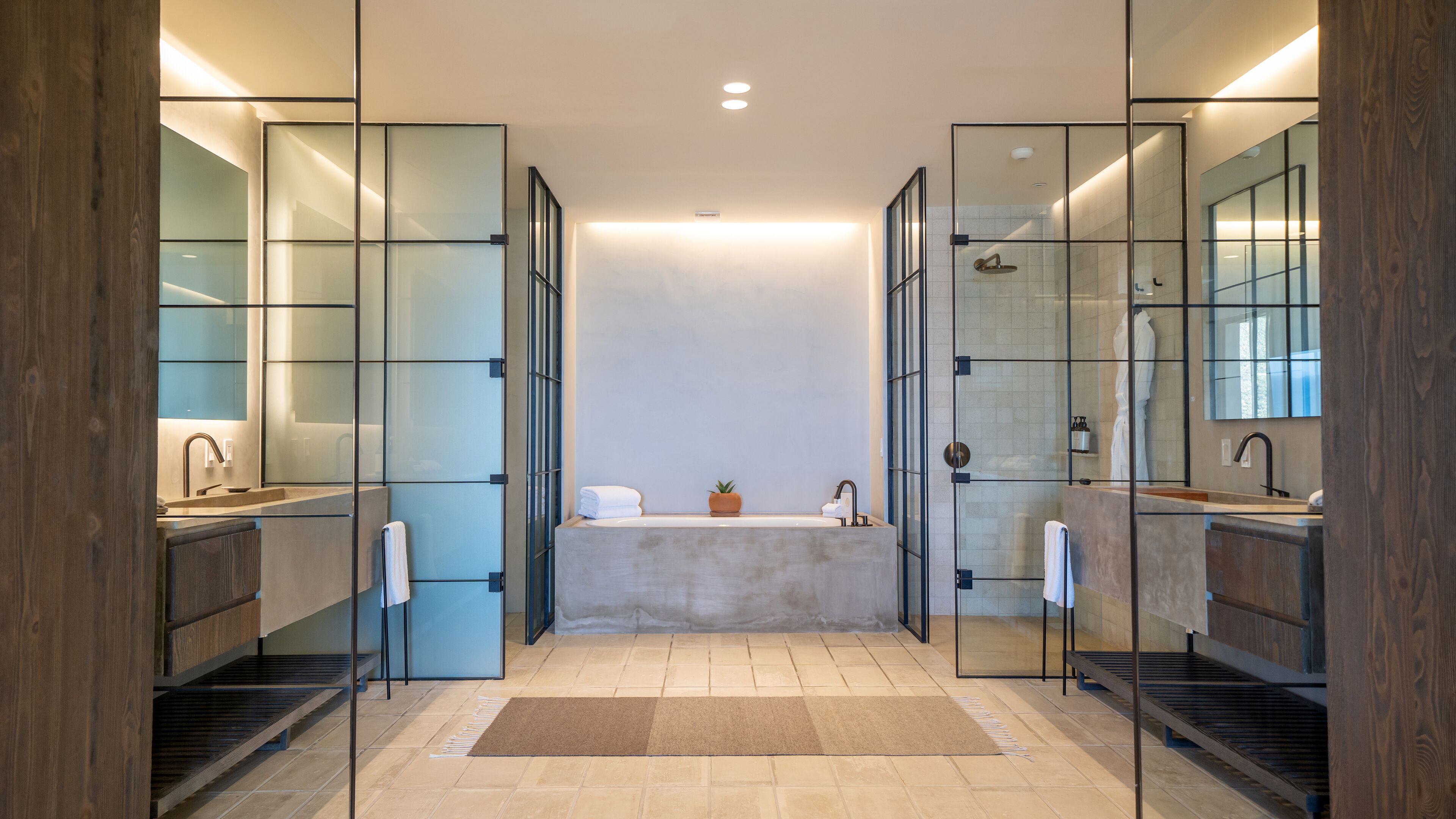 designer toiletries, hair dryer, bathrobes, slippers