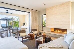 Five Bedroom Beachfront Villa | Living area | 55-inch flat-screen TV with satellite channels, TV - 1 Homes Cabo (Cabo San Lucas)