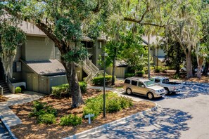 Stylish townhouses with front porches, gardens, and covered entryways.