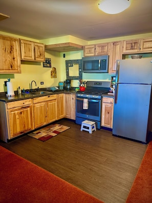 Fridge, microwave, oven, stovetop - Comfortable apartment with spectacular mountain and ocean views.  (CHUGIAK)