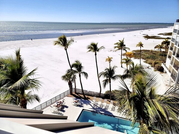 On the beach, sun-loungers, beach towels