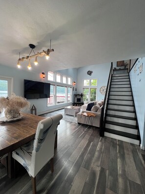 Smart TV, fireplace, books