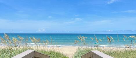 On the beach, sun loungers, beach towels