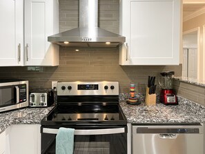 Microwave, stovetop, dishwasher, coffee/tea maker