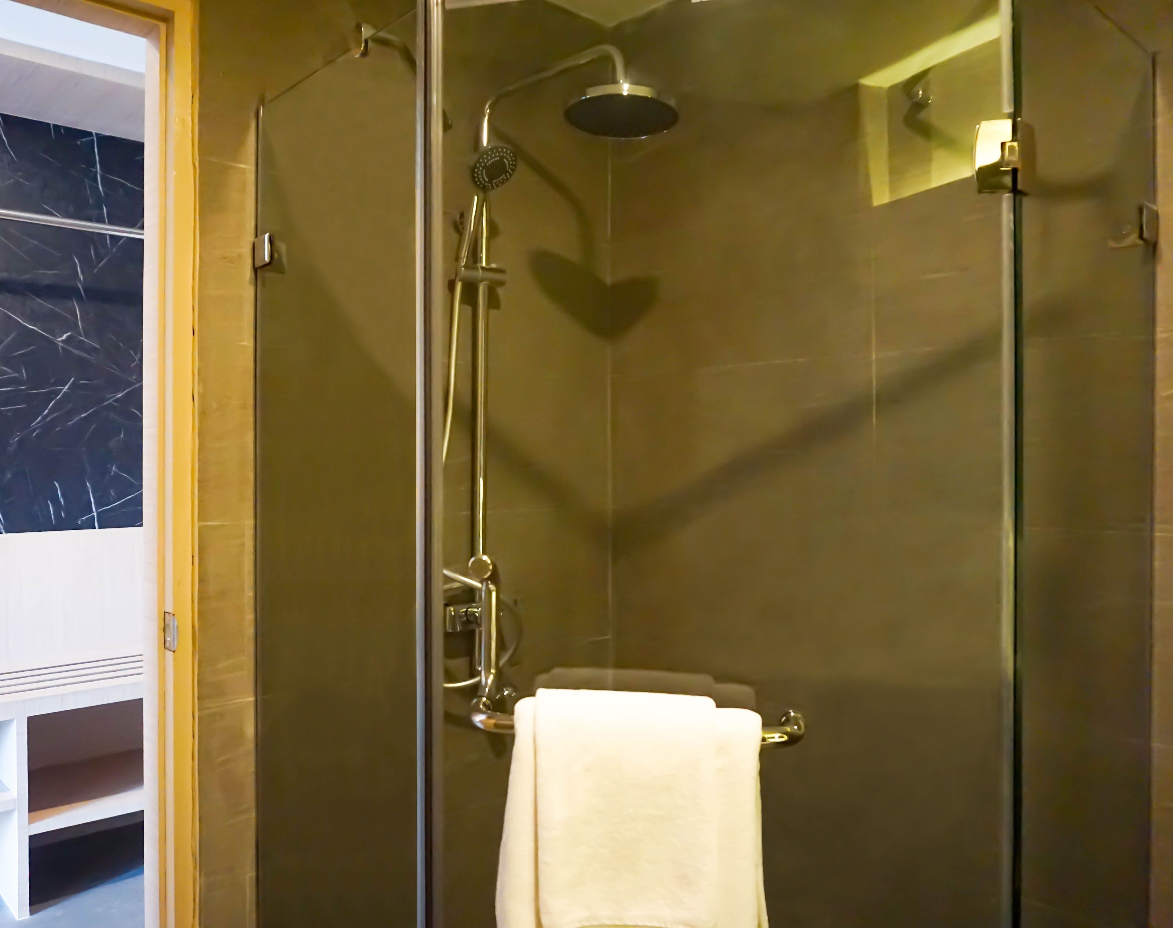 shower, hair dryer, bathrobes, slippers