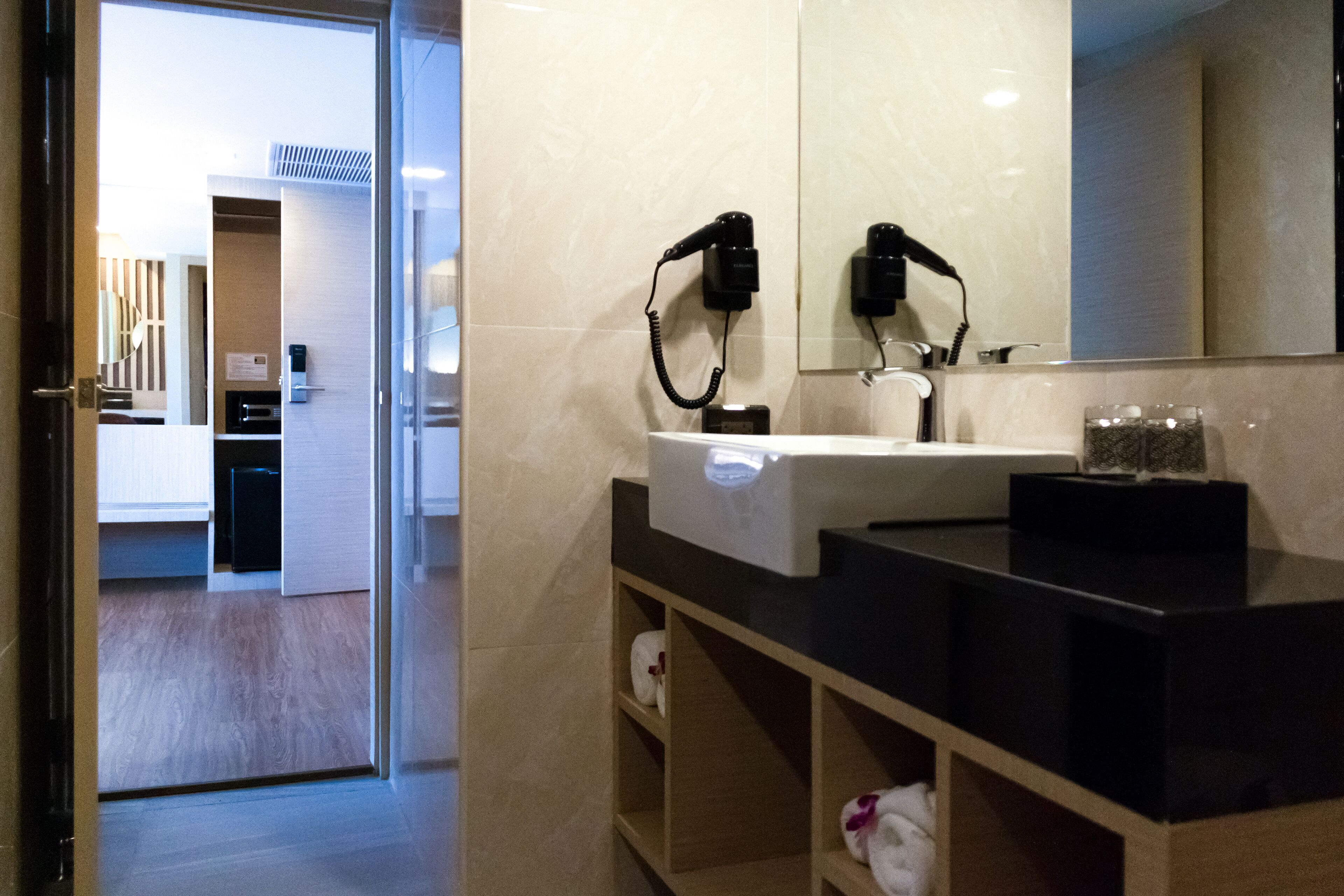 shower, hair dryer, bathrobes, slippers